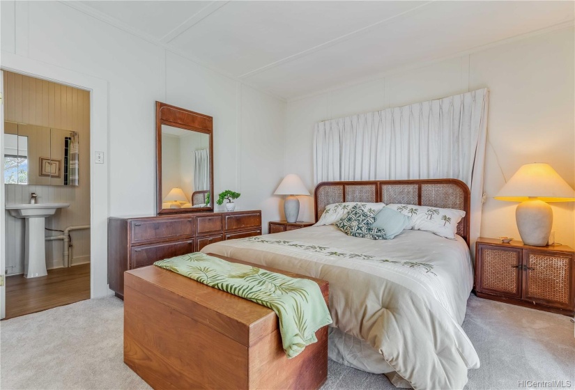 Another view of the bedroom and bathroom