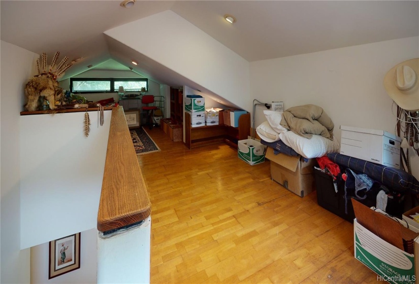 The third floor features a finished attic. Use for Office, Family Room or Work Out space.  (Large storage area rear left of photo not shown).