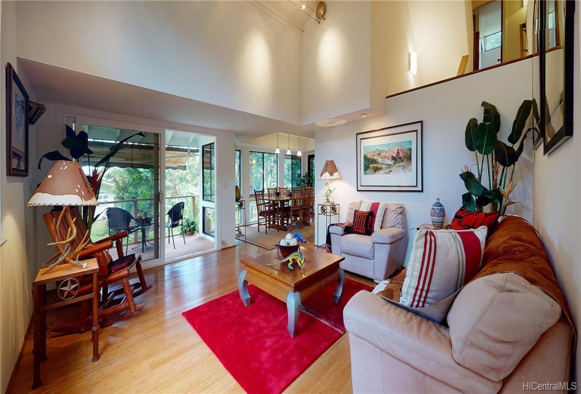 The split level Living Room features a Cathedral Ceiling. Bamboo flooring runs throughout the first floor of home.