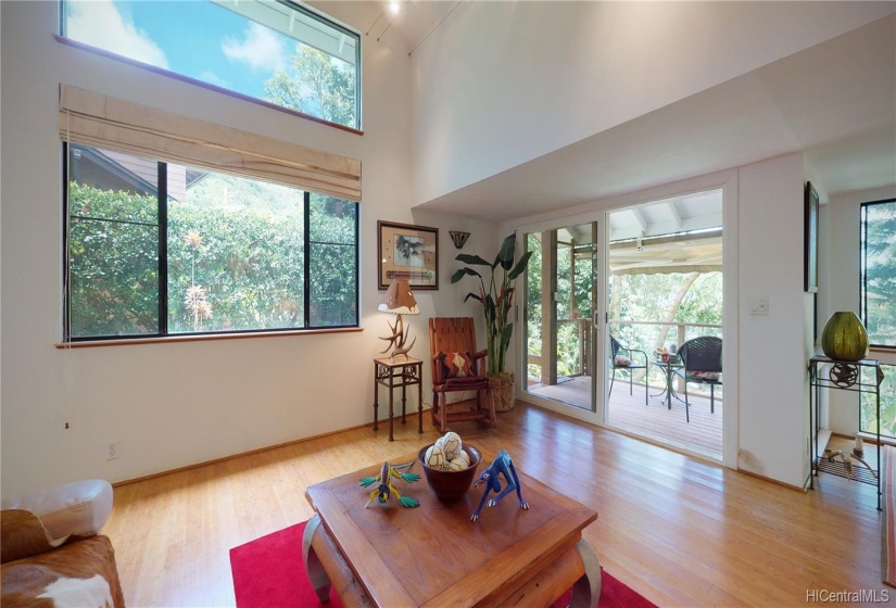 Large windows in the Living Room bring the outside in.