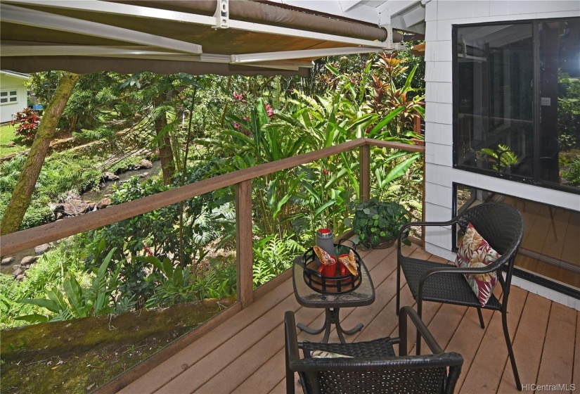 Peaceful and serene, Waihi Stream wraps around this Home on right and in front of both Lanai.