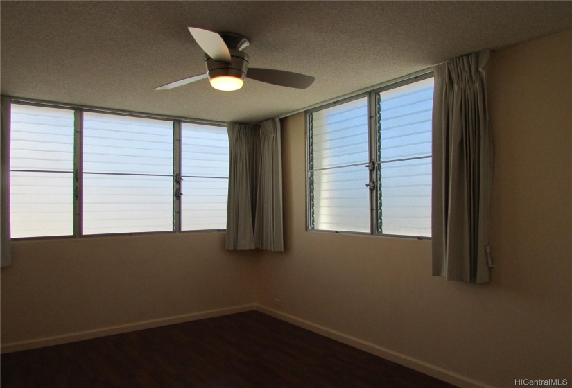 Laminate flooring in the bedroom.  Black out drapes for privacy.