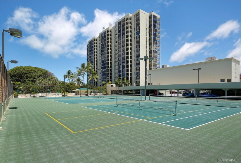 3 tennis courts/ pickle ball court & building on right has 2 racquetball courts.