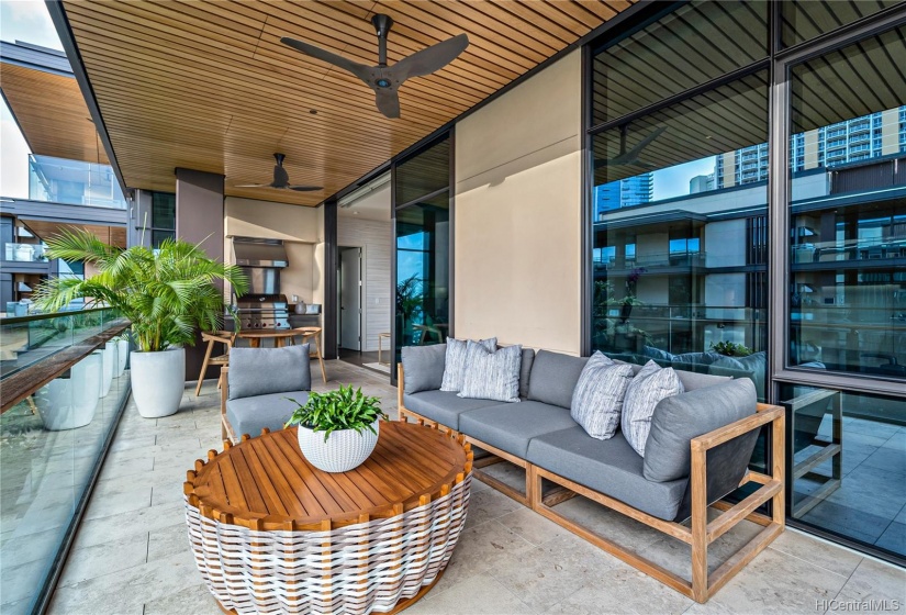 Ample space on outdoor lanai for dining and relaxing.