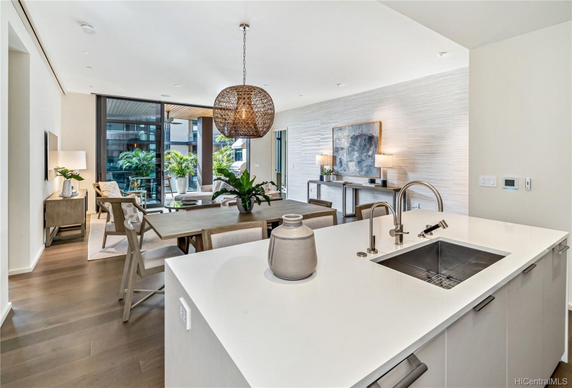 Seamless kitchen design with wine fridge.