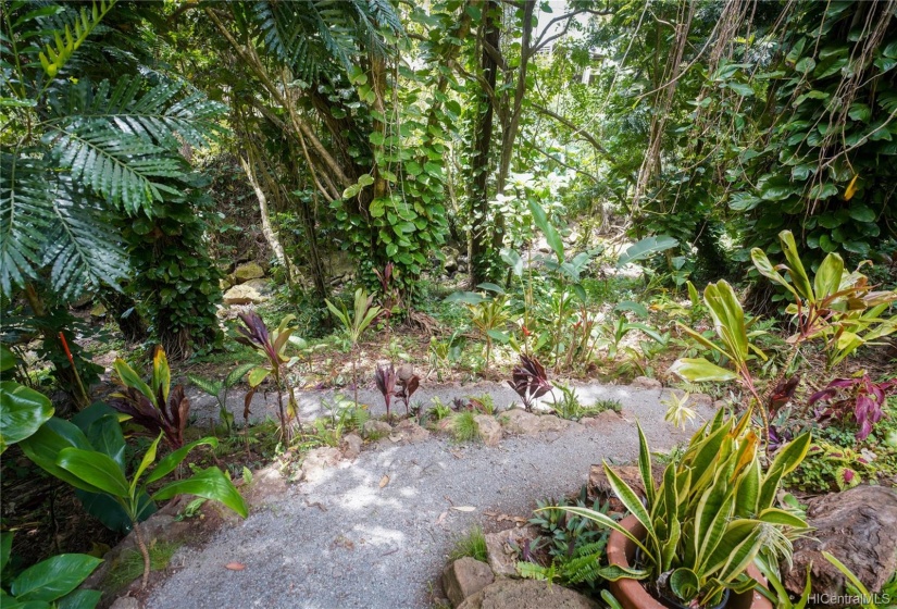 Landscaped nature trail parallels the stream and Lai Road, has multiple access points from the various CPR units.