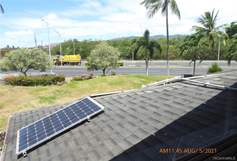 View of street and PV panel from 4th bedroom window.