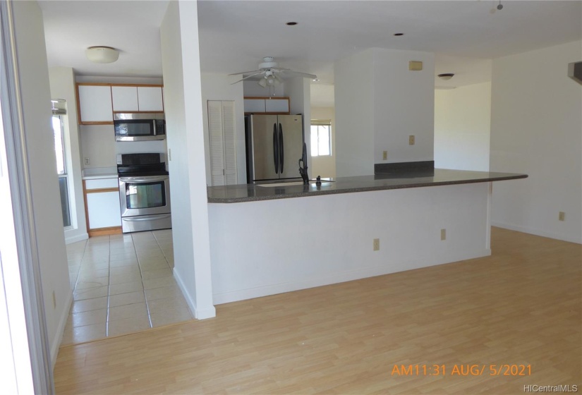 View upon entering home. Looking toward kitchen.