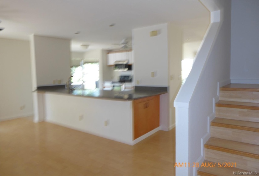 Kitchen counter showing storage (brown doors).