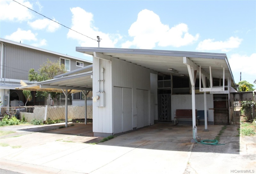 Home with at least 3 covered parking in front.  Enclosed yard with storage closets.