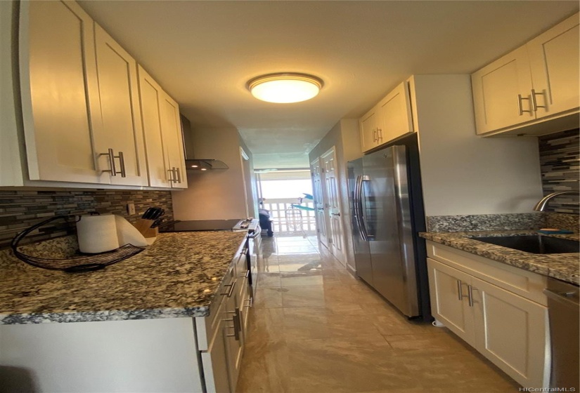 Galley kitchen totally renovated in 2018.  Bathroom is to the left, closet to the right and bedroom is straight ahead.