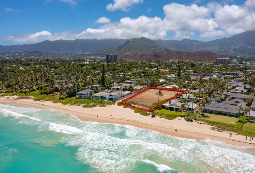 Fronting the beautiful ocean backed by the majestic mountain view- with blue sky above