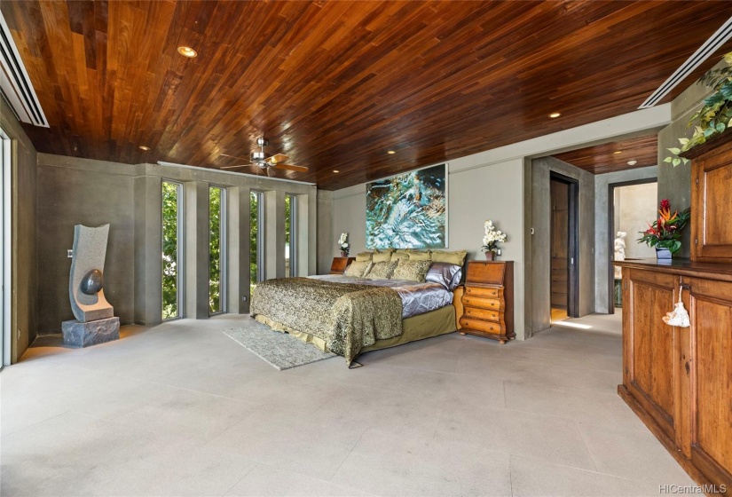 Master suite escape has incredible ocean views along with his/her bathrooms and closets, polished granite counter tops installed by a master stone cutter, solid teak-wood ceiling highlights, private outdoor shower facing the surf and luxurious soaking tub.