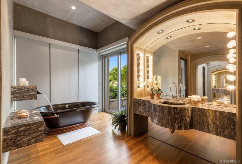 His and Her master bathrooms include https://matrix.hicentralmls.com/Matrix/MediaManager/ShowImage.aspx?tbl=9&mtid=1&tmui=15572614&mf=P15573157574e8432-93b7-41d0-b6bb-ddd3624703caU-1&w=128&h=96&q=99&md=2020-11-23%2012:55:57.230deep soaking tub, polished granite, imported from Italy and  installed by a master stone-cutter, solid 1