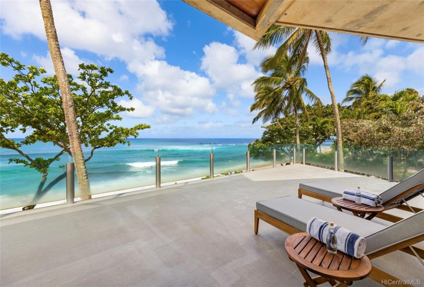 Lounge chairs and deck off of the Master suite escape positioned to allow you to watch the whales and surfers off Sunset Point.