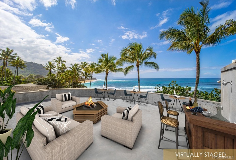 Imagine dinner under the stars up here. This roof-top lanai, 1 of 3 outdoor lanai spaces overlooking the beach will mesmerize your guests!