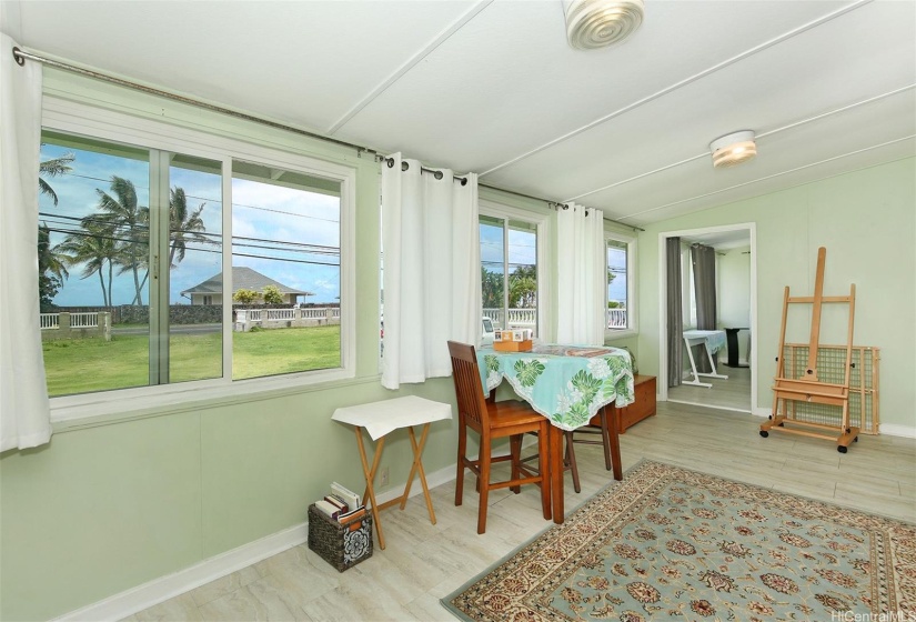 Enclosed front porch area.