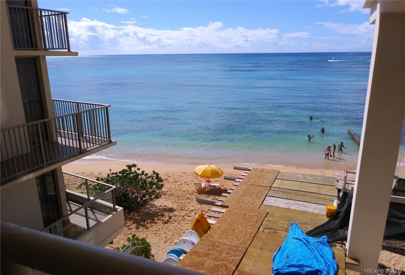 Beach Ocean view from the 3rd floor common area walkway, just above the project's gated beach entrance, shower and surf board storage.