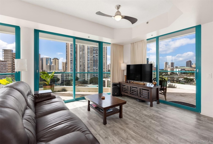 Living room in the Penthouse. Partial views of the ocean facing EWA.