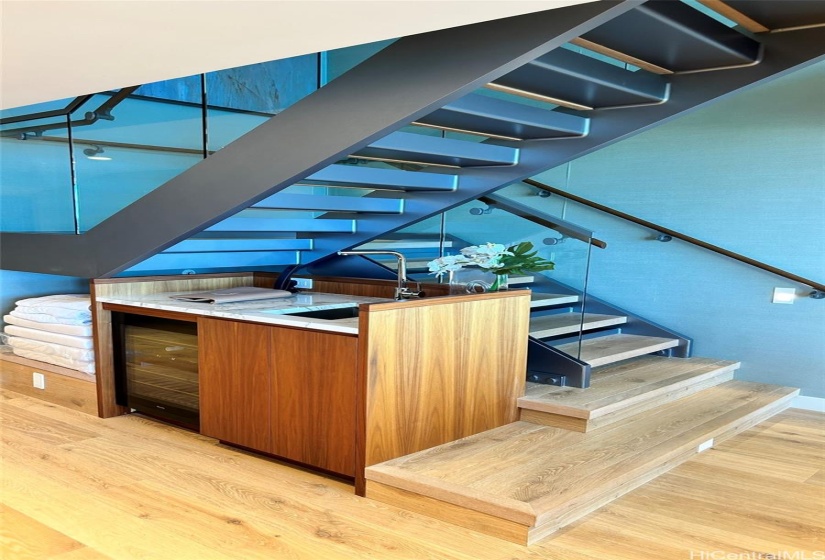 Staircase and wet-bar on the 28th floor.