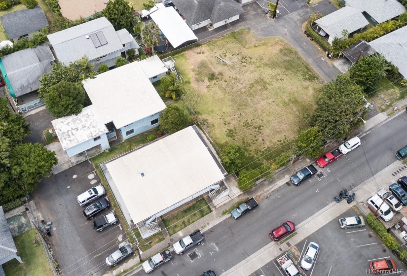 614 Wailepo Street - vacant lot as well as the two adjacent buildings and parking.