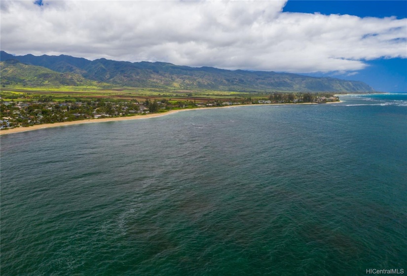 Miles of white sandy beach fronting the property