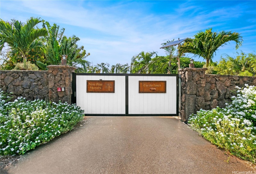 Gated and walled private entrance.