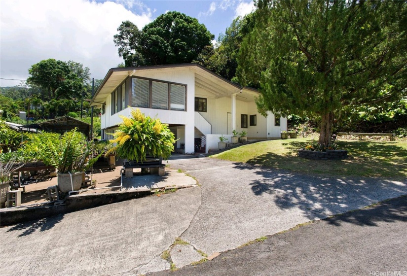 The main house is on the right side of the driveway (valley side of the property).