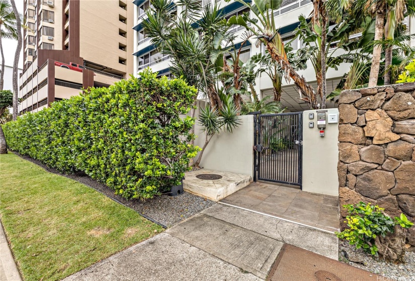 Gated entry to Fairway Manor from Ala Wai Blvd.