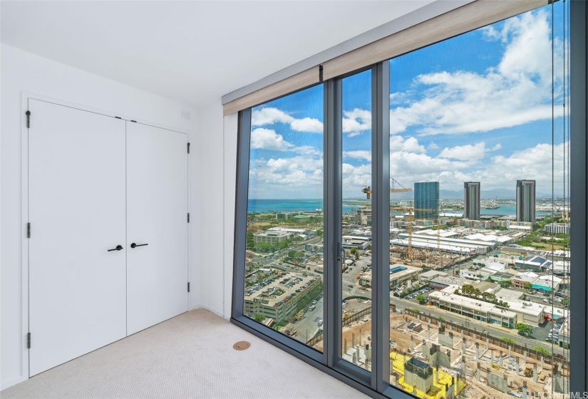 Guest Bedroom features sweeping ocean/city views.