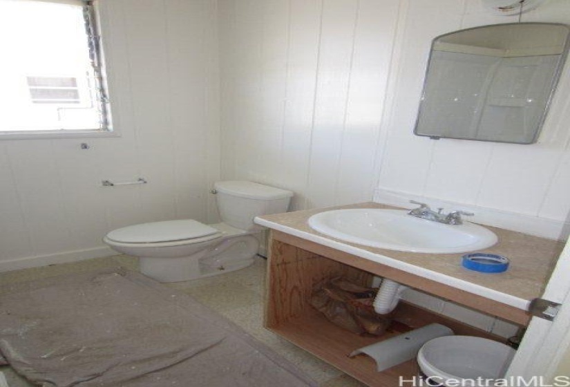 The bathroom in the 2 bedroom with the shower to the left.