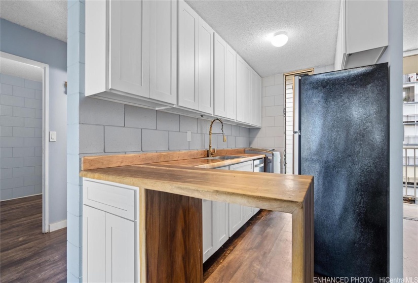 Updated 3 years ago, kitchen hallway and bedroom. Digitally Enhanced; Cleaned out