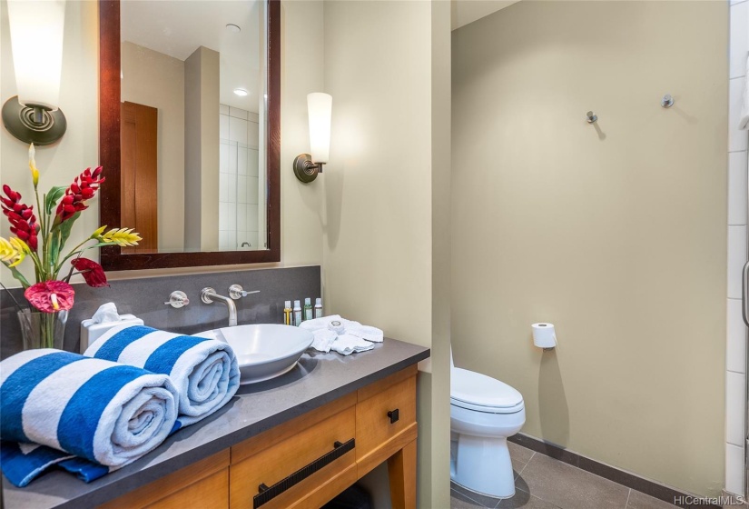 Bathroom with shower, right outside the twin bedroom.