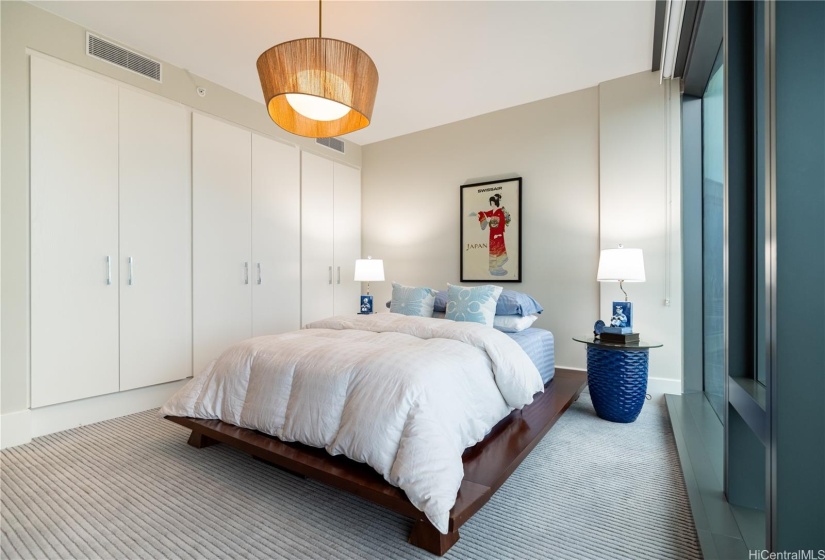 Guest Bedroom with ample Storage Cabinets