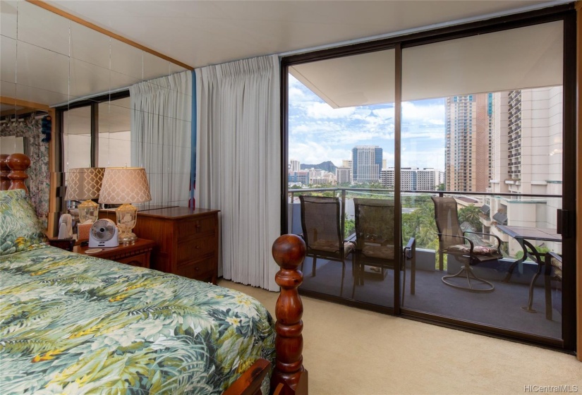 Master bedroom with Diamond head and ocean views. Tinted window glass.