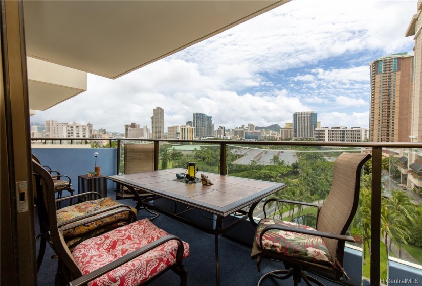 Large Lanai accommodates table and chairs for outdoor dining and relaxation.