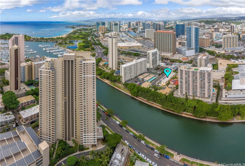 The green belt of the Ala Wai Canal is adjacent to Kahakai Drive.