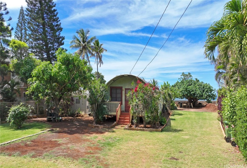 Adorable quonset hut with public water, electricity, sewer