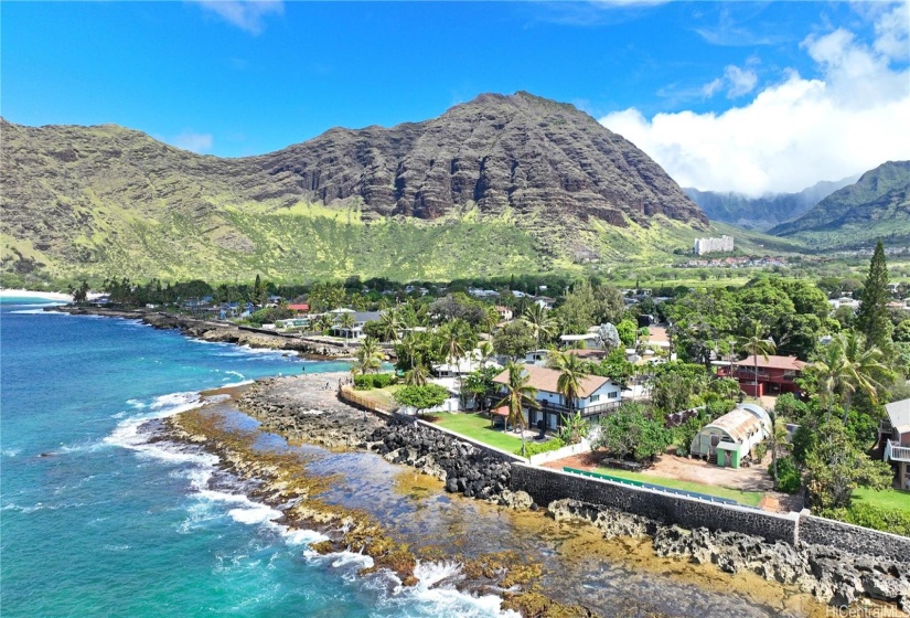 Large protective coral reef stretches the point