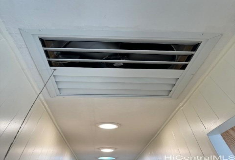 Hallway Attic Fan keeps house cool on the