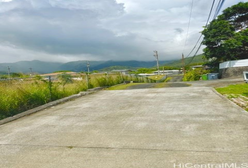 Driveway to the main road.Feels very private since there is a vacant lot narrow lot owned by C&C.