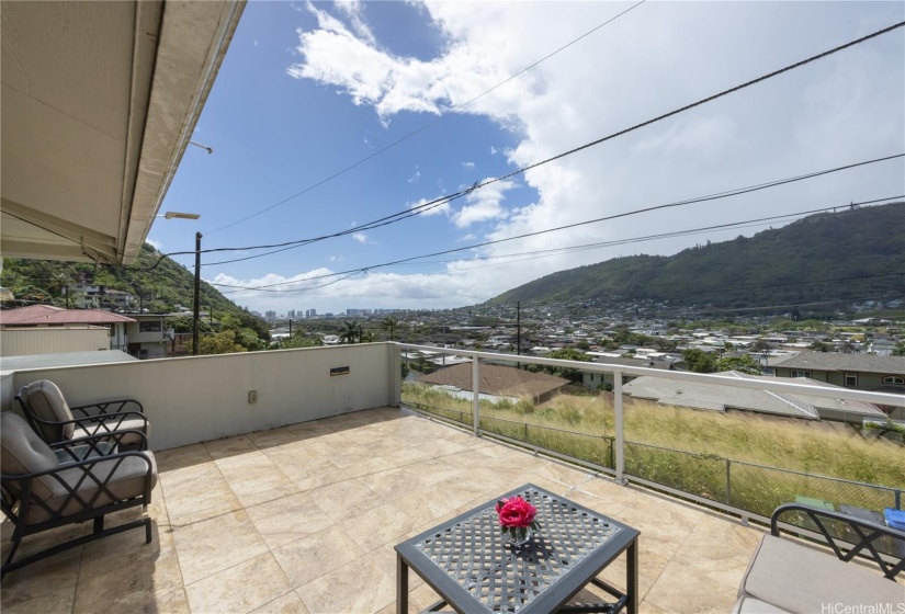 Mountain, city, and peek a boo ocean views.