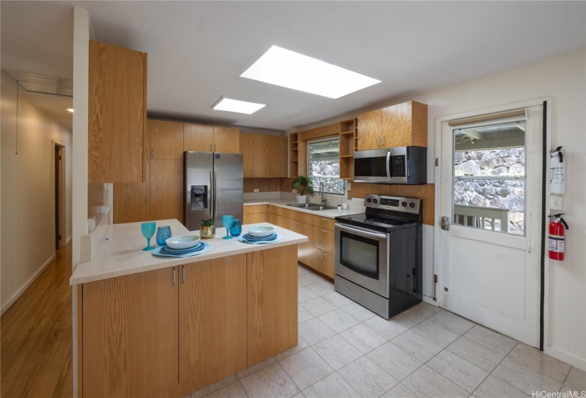 Bright and airy kitchen with skylight and solar light