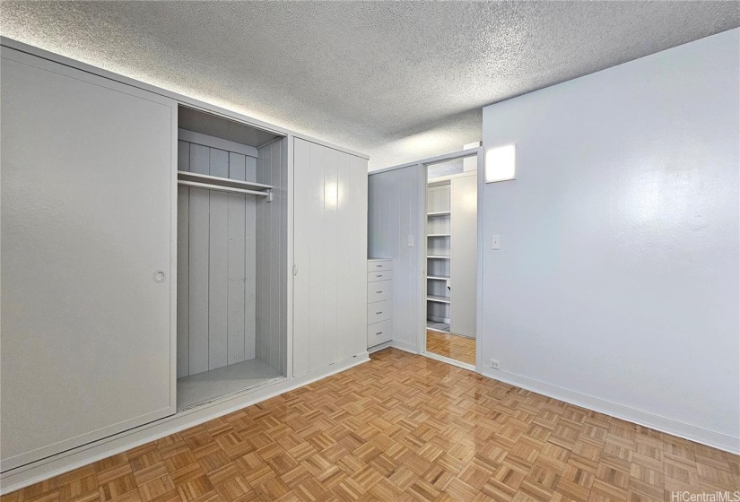 Bedroom with cloth set and built in drawer