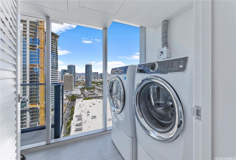 side by side washer/dryer room