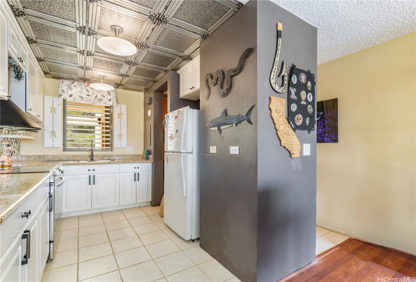 Open concept kitchen, living and dining.