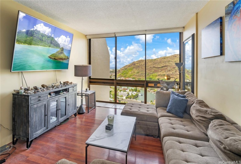 Expansive living area with marina, mountain & ocean views