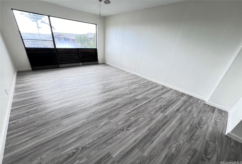 Living Room with new laminate vinyl flooring, ceiling fan