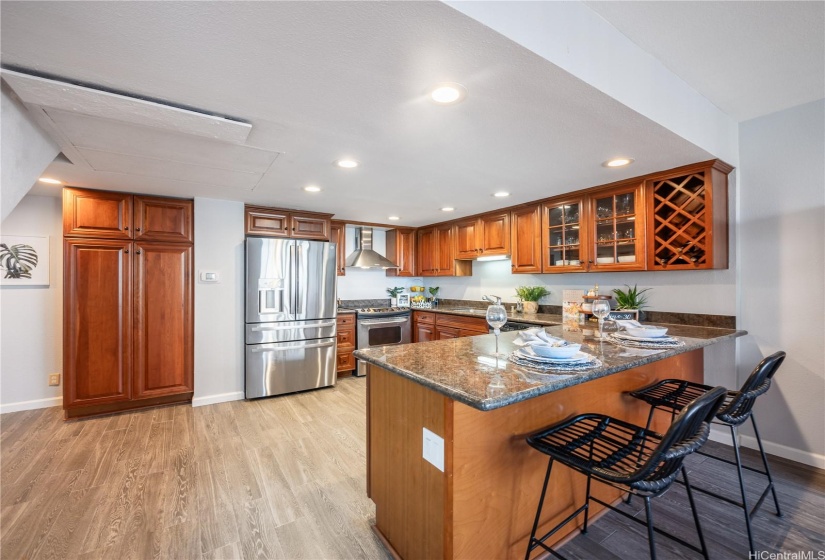 Open Design Floor Plan offers Island Dining, lots of Storage in your Custom Cabinetry & No Sacrifice for Space in this Substantial Sized Penthouse!