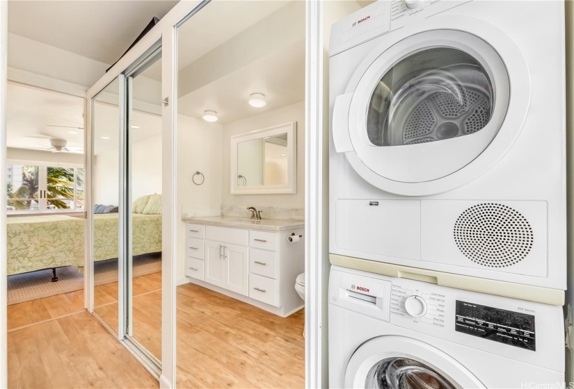 Move the closet door back to find the Bosch washer & dryer.